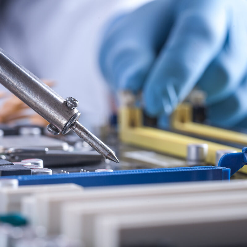 The Scientist Holds the Computer Part